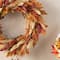 Glitzhome® 24" Fall Sorghum Wreath Includes a Black Metal Wreath Hanger